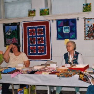 Rhonda Harrell, Marilyn Estes, Joanne Smith, and Eva Foster at Quilt Show
